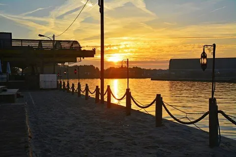 Abendsonne an den Osmohallen – Münster-Motiv von Birgit Leimann