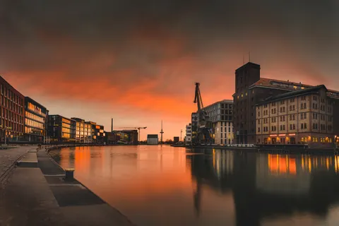 Theater am Hafen im Abendrot – Münster-Motiv von Sascha Talke