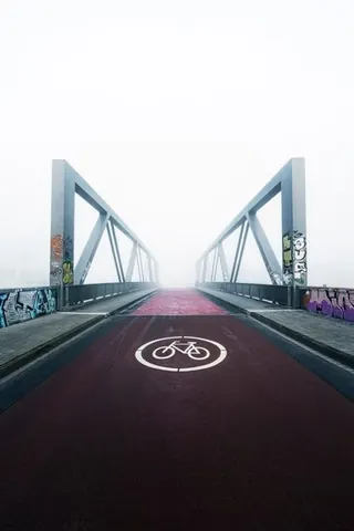 Radbrücke im Nebel – Münster-Motiv von Sascha Talke