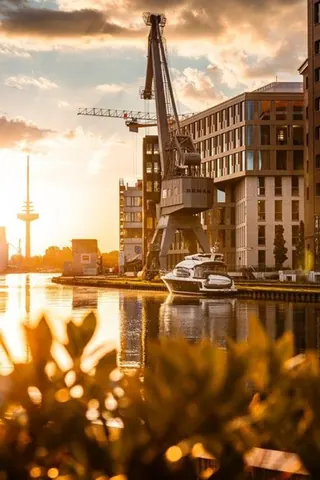 Hafenkran im Sonnenuntergang – Münster-Motiv von Sascha Talke
