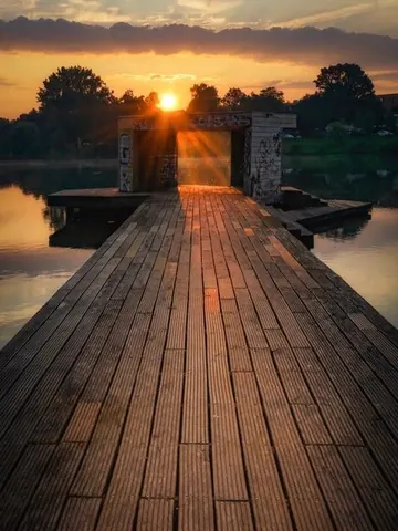 Pier in der Abendsonne – Münster-Motiv von Thomas Branse