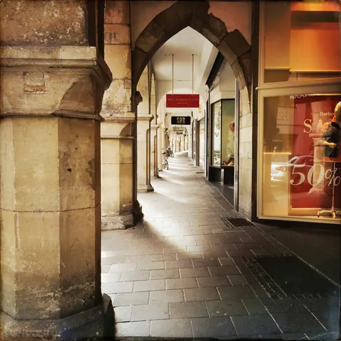 Unter den Arkaden – Münster-Motiv von Wolfgang Nietan